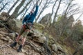 Climber insures a partner against the backdrop of the mountains. Royalty Free Stock Photo