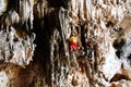 A climber in the Jianshui Swallow Cave in Yunnan province, China.