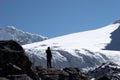 Climber looking at mountain slope, Himalaya, Nepal Royalty Free Stock Photo