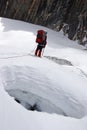 Climber looking for a pass between crevices, Himalayas, Nepal Royalty Free Stock Photo