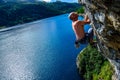 Climber man above the Lake Royalty Free Stock Photo