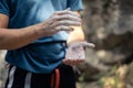 Climber coating his hands in magnesium before climb.