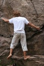 Climber preparing to the next move on his way Royalty Free Stock Photo