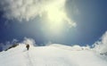 Climber reaches the summit of mountain peak