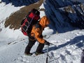 Climber reaching the summit