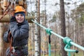 Climber is ready to the passage the ropes course Royalty Free Stock Photo