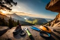 A climber\'s nut tool and protection gear laid out on a rocky ledge, ready for traditional lead climbing