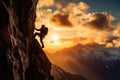 Climber Scaling Mountain at Sunset Royalty Free Stock Photo