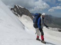 Climber on snow alpinist route Royalty Free Stock Photo