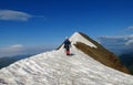 Climber on snow alpinist route Royalty Free Stock Photo