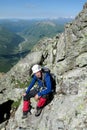 Climber on stone mountain route Royalty Free Stock Photo