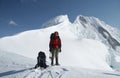 Climber on the summit Royalty Free Stock Photo