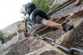 Climber tackling steep stone stairs on Huashan mountain