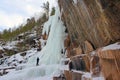 Climber training on a frozen waterfall. Stolby Nature Reserve. Krasnoyarsk region. Russia