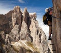 Climber on via ferrata in Italy dolomities Royalty Free Stock Photo