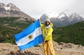 Climber waving a flag of Argentina