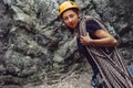 Climber woman standing with rope outdoor