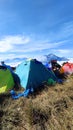 climber's tent stands on the peak of Mount Prau, Central Java, Indonesia