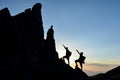 Climbers accessing pointy rocks