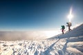 climbers climb to the top of the mountain in winter Royalty Free Stock Photo