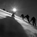 Climbers climbing the glacier