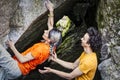 Climbers couple bouldering spotting Royalty Free Stock Photo