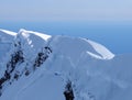 Climbers on edge of crater of volcano Beerenberg