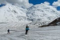 Climbers on glacier traver mountain route attached to the alpinist rope Royalty Free Stock Photo