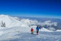 Climbers on glacier traver mountain route attached to the alpinist rope Royalty Free Stock Photo