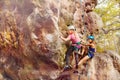 Climbers in helmets with lead climbing the rock Royalty Free Stock Photo