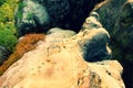 Climbers metal ladder via ferrata. Iron twisted rope fixed in block by screws snap hooks. The rope end anchored into sandstone roc Royalty Free Stock Photo