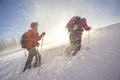 Climbers in mountain snowfall