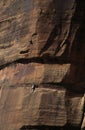 Climbers On Sandstone Wall