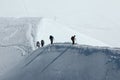 Climbers on snow ridge