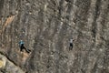 Climbers on an almost vertical wall of a mountain Royalty Free Stock Photo