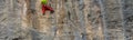 Rock climber climbing on the cliffs of Baunei, Sardinia, Italy Royalty Free Stock Photo