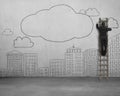 Climbing businessman drawing clouds with copy space on concrete