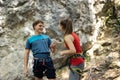Male and female climber talking and having fun before climb