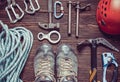 Climbing equipment  on dark wooden background, top view Royalty Free Stock Photo