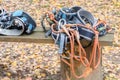 Climbing equipment. climbing straps with safety ropes, aluminum carabiners, loops and braces on the bench. lifestyle. life saving Royalty Free Stock Photo