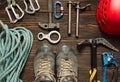 Climbing equipment on dark wooden background, top view Royalty Free Stock Photo