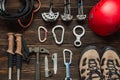 Climbing equipment on dark wooden background, top view Royalty Free Stock Photo