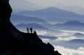 Daily climbing and excitement of successful climbers in summit mountains Royalty Free Stock Photo