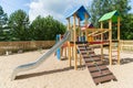 Climbing frame with slide on playground at summer Royalty Free Stock Photo