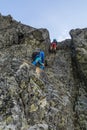 Climbing the Franz chimney Franz-kemeny, which has been provided with artificial facilities such as braces and chains.