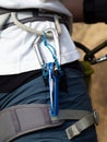 climbing gear in the climber's harness. carabiners and knife to cut the rope in a emergency Royalty Free Stock Photo