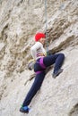 Climbing girl in the rocks Royalty Free Stock Photo