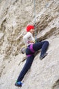 Climbing girl in the rocks