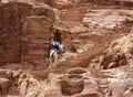 Climbing on horseback. canyon