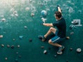 A man climbing in boulder gym in the wall. Royalty Free Stock Photo